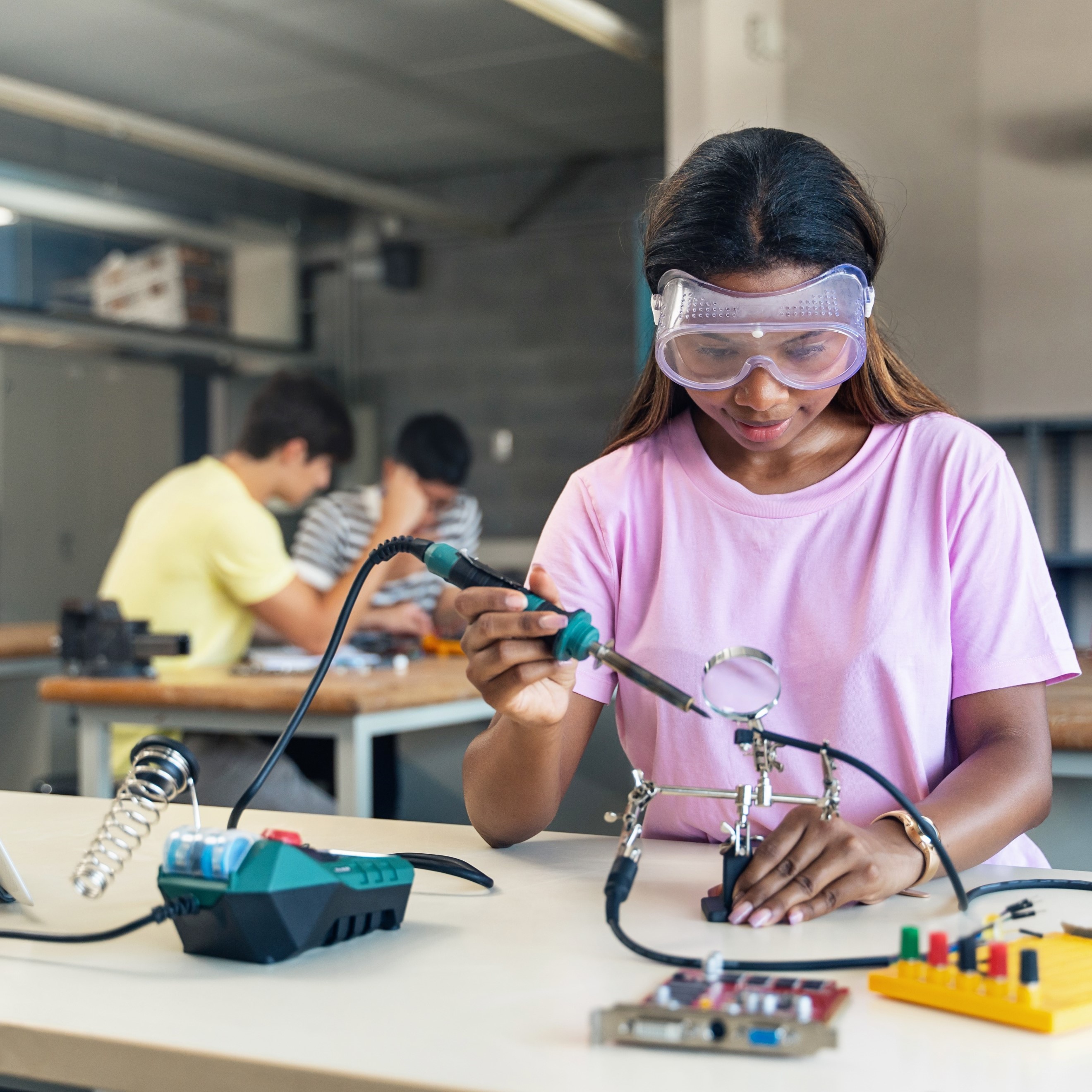 A girl performs a science experiment 